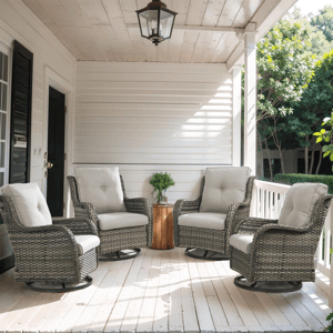 Four cushioned wicker swivel chairs are arranged on a covered porch, surrounding a small wooden side table.
