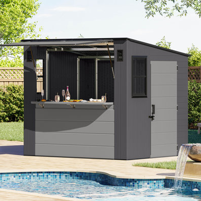 A modern outdoor bar shed with a windowed side, retractable serving counter, and surrounded by a pool setting.