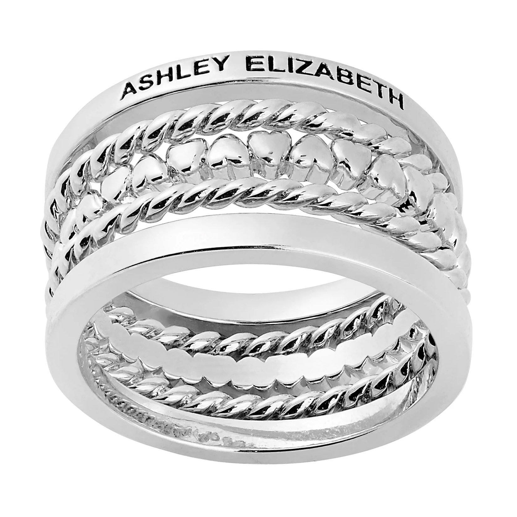 A silver 5-piece custom stackable ring set features engraved text \“ASHLEY ELIZABETH\“ with a design incorporating twisted rope and heart patterns, creating a stylish, layered appearance.