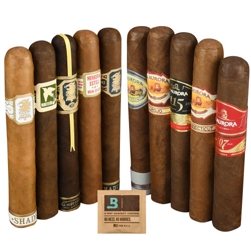 A variety of cigars with diverse bands, including brands like Undercrown and La Aurora, accompanied by a Boveda humidity control pack.
