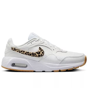 White athletic shoe with a leopard-print swoosh design, cushioned sole, and gum outsole.