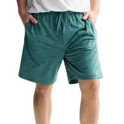 Teal shorts with a drawstring waist feature a subtle fish pattern, paired with a white shirt.