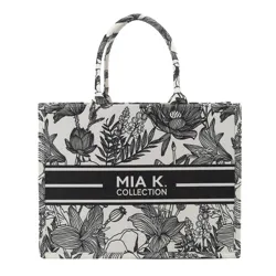 A black and white floral tote bag with the text \“MIA K. COLLECTION\“ printed in a black stripe across the front.