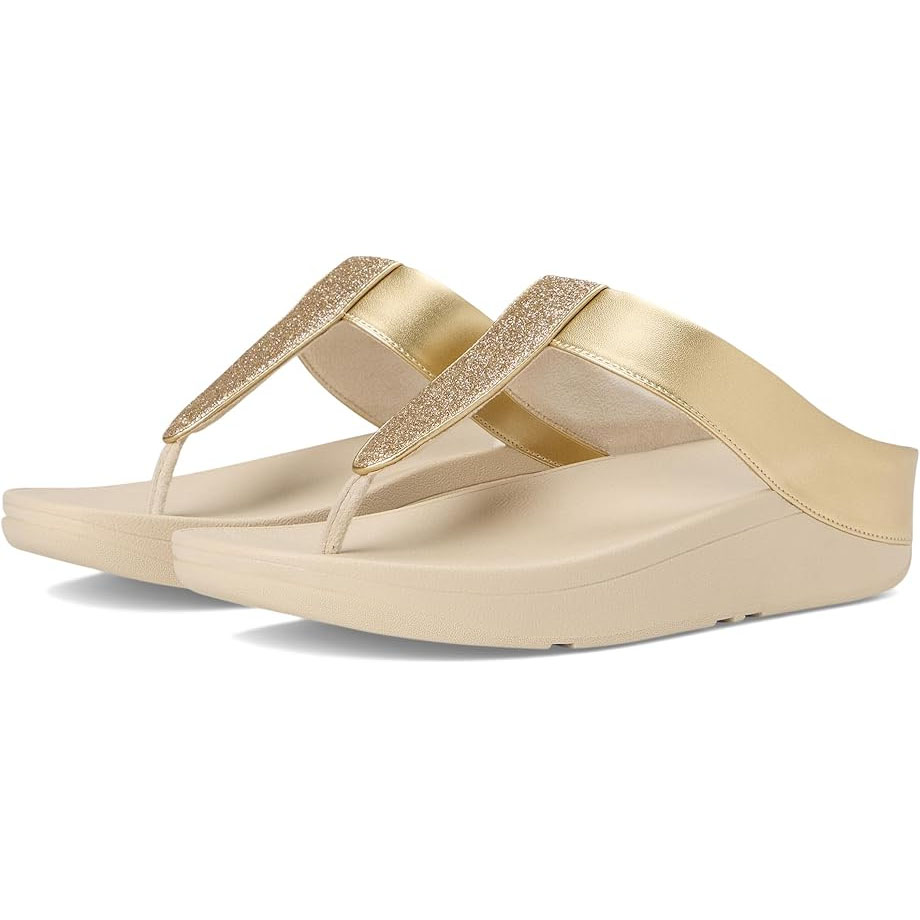 Gold wedge flip-flop sandals with a glittery strap design and cushioned sole for comfort.