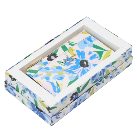 A floral-patterned wallet with blue and green flowers is presented in a decorative matching gift box.