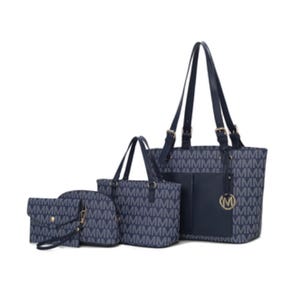 A set of four matching navy bags with an \“M\“ pattern, including two tote bags, a clutch, and a pouch, all featuring gold accents and hardware.