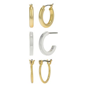 A set of gold and silver hoop earrings in various sizes and shapes.