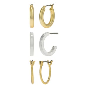 A set of gold and silver hoop earrings in various sizes and shapes.