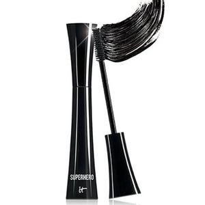 A black mascara from IT Cosmetics with the name \“Superhero,\“ featuring a curved brush applicator.