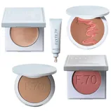 Four makeup items from Flyte.70, including a highlighter, a tube of concealer, a bronzer with pink detail, and a blush compact.