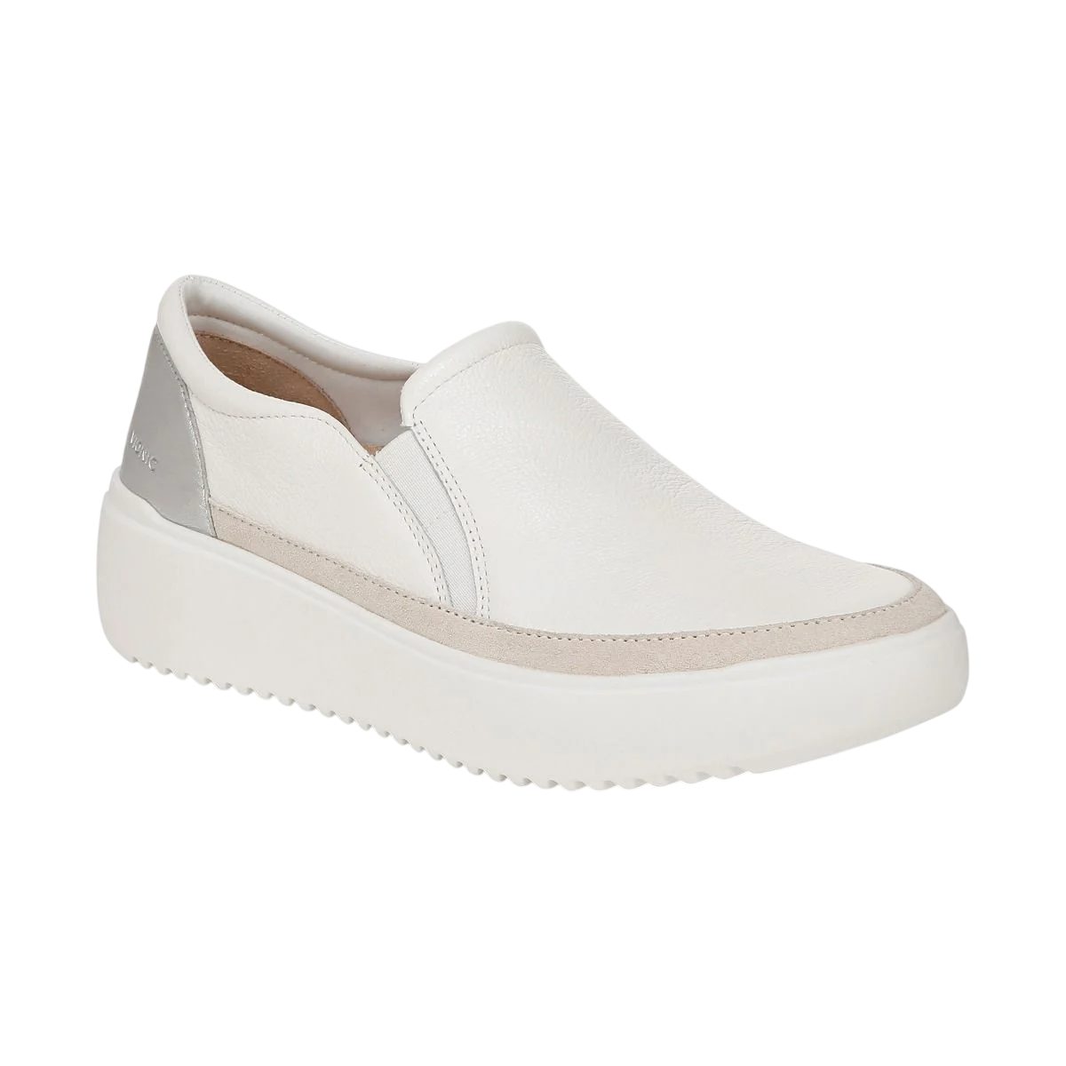 White slip-on sneaker with a textured platform sole and a contrasting grey heel patch.