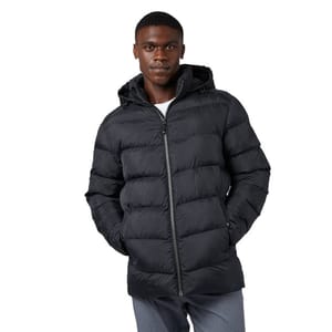 A man is wearing a black puffer jacket with a zip-up front, hood, and horizontal quilted design, paired with gray pants.