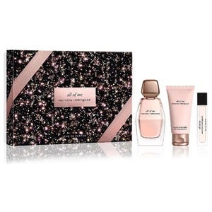 Narciso Rodriguez 3pc fragrance set includes a shimmering gift box with \“all of me\“ eau de parfum, a matching scented lotion, and a travel-sized spray.