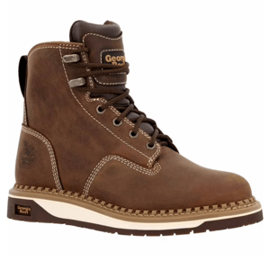 Brown leather work boot with white stitching, padded collar, and metal eyelets for laces. Features a label with \“Georgia Boot,\“ a logo on the side, and a rugged sole for durability.