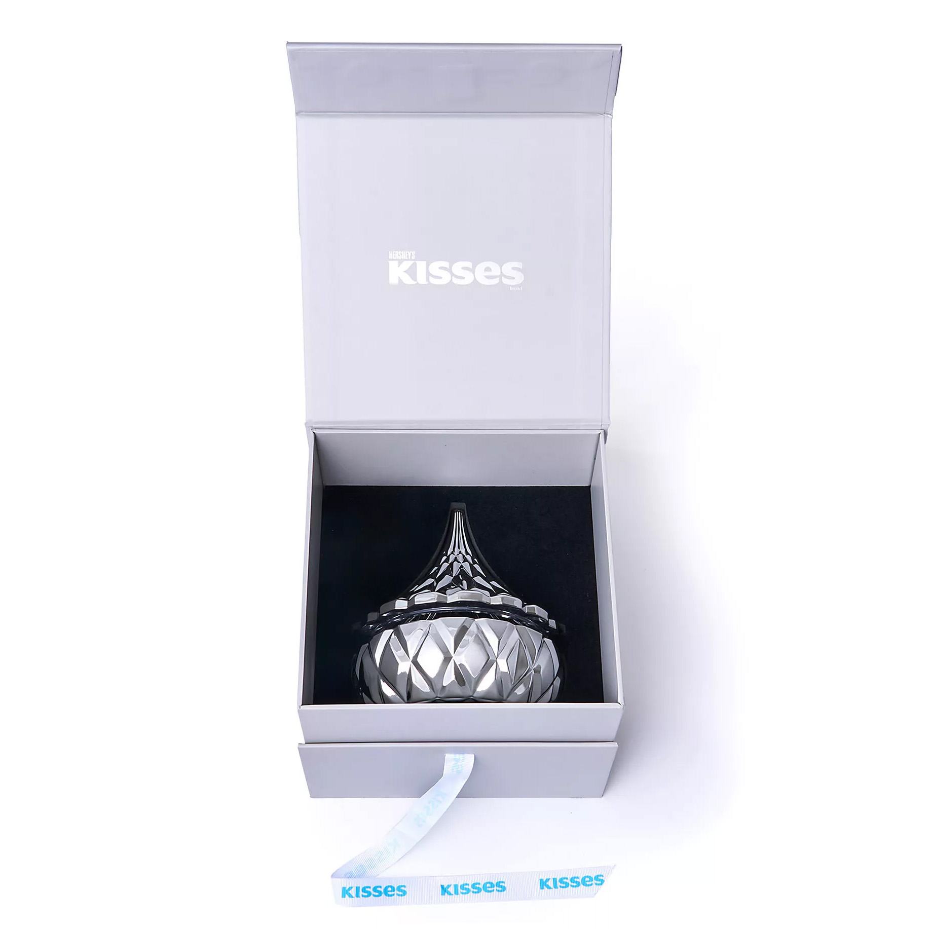 A Hershey's Kisses decorative container resembling the iconic candy shape is shown in an open presentation box with a Hershey's Kisses label.