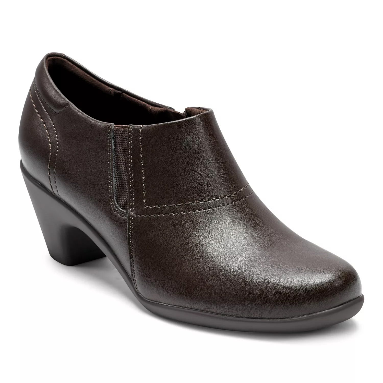 Brown leather wedge heel shoe with side elastic and stitch detailing.