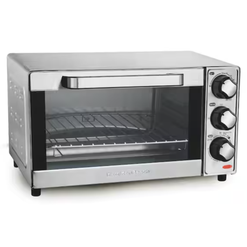 A stainless steel countertop toaster oven with three control knobs, featuring temperature, function, and timer settings. It includes a glass door and a removable wire rack.