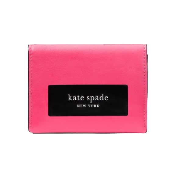 A pink Kate Spade New York wallet with a black rectangular logo on the front.