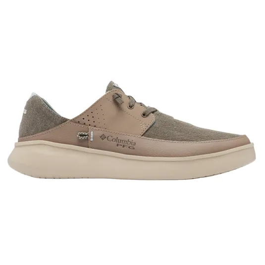 A tan and brown Columbia PFG casual shoe featuring a textured fabric upper, perforated leather accents, and a cushioned sole, designed for comfort and style.