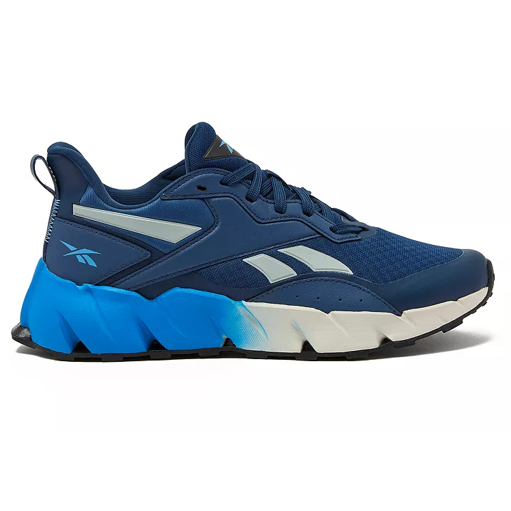 Blue athletic shoe with a dynamic design, featuring a thick white and blue sole, lace-up front, and brand emblem on the side.