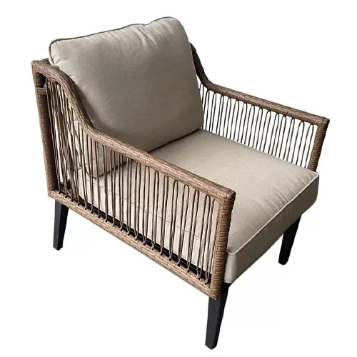 A wicker-style armchair with light beige cushions, featuring a woven back and side design on black legs.