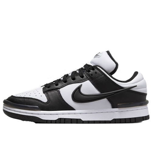 A black and white Nike sneaker with a low-top design, featuring the iconic swoosh logo on the side, perforated toe box, and a white midsole.