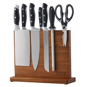 Magnetic knife block with a natural wood finish holds five knives, a sharpening steel, and kitchen shears. Knives have black handles with triple rivets, including a cleaver, chef's knife, serrated knife, and more.