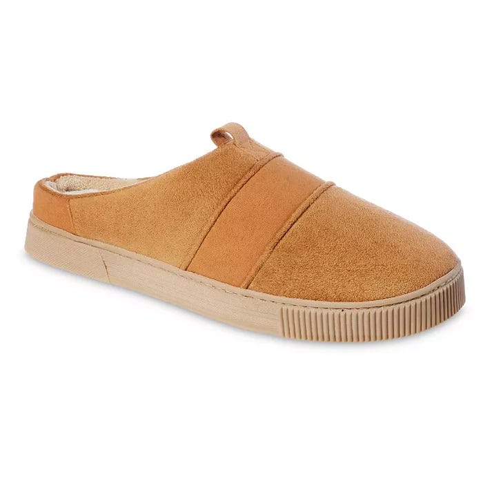 Tan slip-on shoe with a suede-like texture, featuring a flat sole and a small pull tab on top.