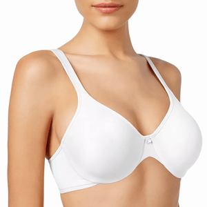 A woman is wearing a white, seamless underwire bra with thin straps and a small bow detail at the center front.