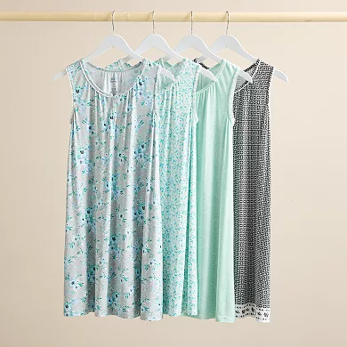 Four sleeveless nightgowns are displayed, each with a different pattern, ranging from floral to geometric prints, in shades of blue and aqua.