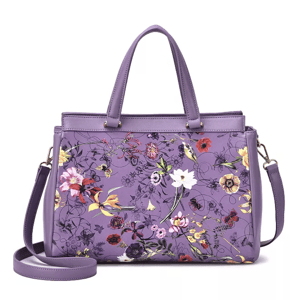 A purple handbag with a colorful floral pattern, featuring both handles and a detachable shoulder strap.
