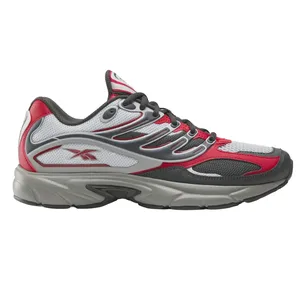 A sneaker featuring a mesh and leather upper with red, white, and gray color accents, and a cushioned sole. It includes a distinct logo on the side and a durable rubber outsole.