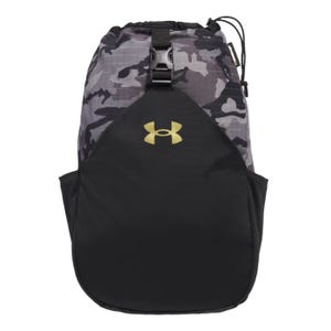 A black and gray camouflage backpack with a top buckle and a gold Under Armour logo on the front.