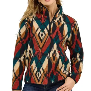 A cozy fleece pullover featuring a colorful, geometric southwestern pattern with a quarter-zip design and a front pocket.