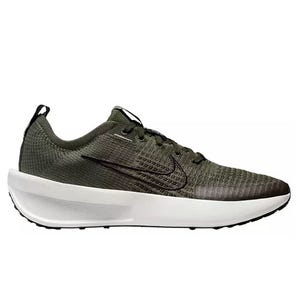 Nike Women's Interact Running Shoes feature an olive green knit upper, black swoosh logo, lace-up design, and a thick white foam sole for comfort and support.