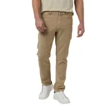 A person wears beige slim-fit jeans paired with white sneakers featuring black accents and a light-colored t-shirt.