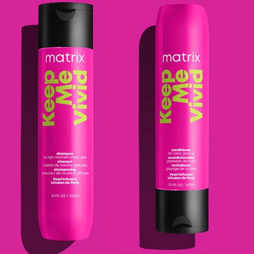 Matrix Keep Me Vivid shampoo and conditioner in bright pink bottles.