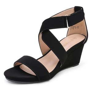 Black wedge sandals featuring a strappy design with crisscross ankle straps and an open toe. They have a comfortable heel height and an adjustable buckle closure.