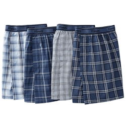 A set of four Hanes men's boxers in varying blue plaid and check patterns with elastic waistbands.