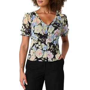 The Brennan Floral Top features a V-neck and button-up design with short, ruched sleeves. It showcases a pastel floral pattern on a black background, creating a delicate and stylish look.