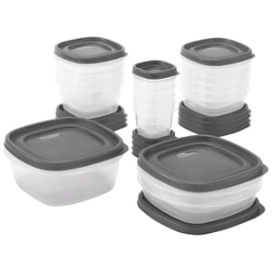 A set of stackable, clear plastic storage containers with gray lids in various sizes for organizing or storing food.