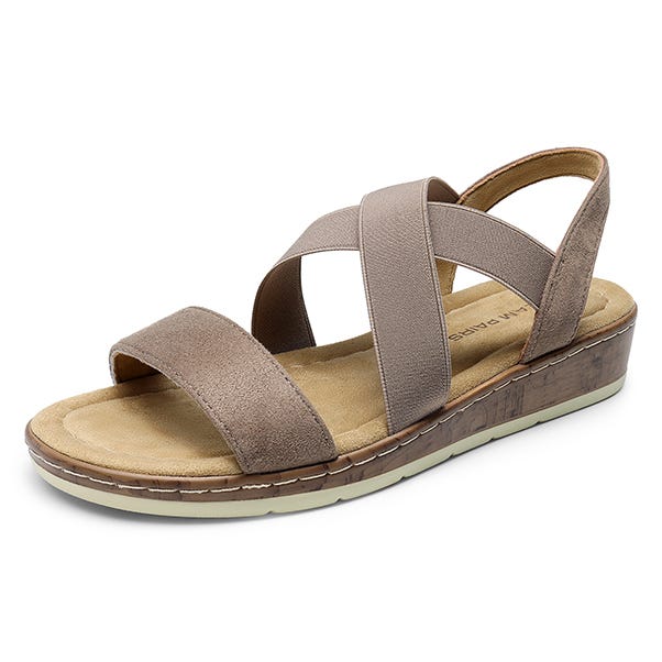 A casual sandal with a light brown, criss-cross strap design, cushioned tan footbed, and a cork-patterned wedge sole, suitable for comfortable everyday wear.