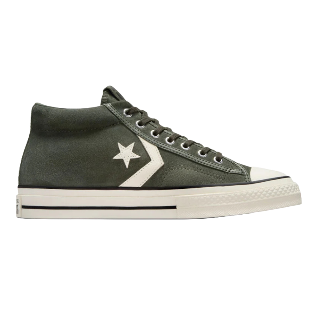 Converse Star Player 76 Shoes in dark green suede feature a high-top design with a white star and chevron logo on the side, metal eyelets, off-white rubber sole with a black stripe, and a classic toe cap.
