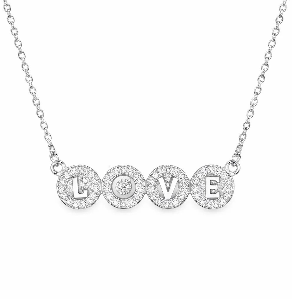 Silver necklace with circular pendants spelling \“LOVE\“ in capital letters, each embedded with sparkling stones.