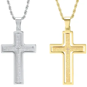 Two cross necklaces, one silver and one gold, each featuring engraved text from the Lord's Prayer.