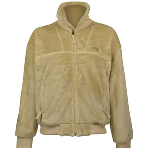 A beige fleece jacket from The North Face with a full zipper, high collar, and ribbed cuffs and hem.