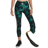 A person wearing green and black patterned leggings with a prosthetic running blade, paired with a black and white sneaker.