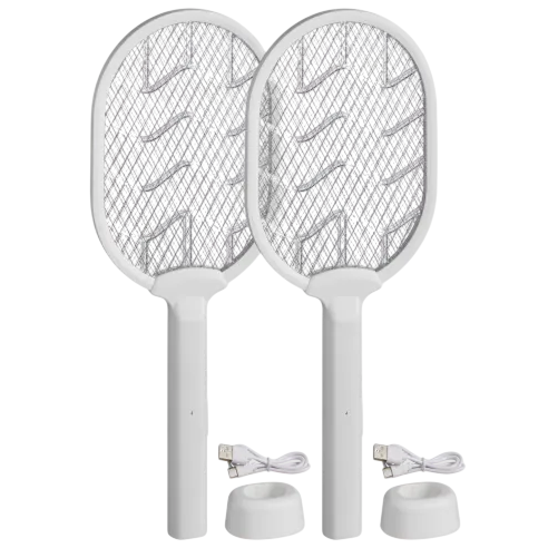 Two white electric fly swatters with charging bases and USB cables.