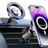A MagSafe-compatible phone mount is attached to a car's air vent, holding a smartphone securely in view with a magnetic ring interface.