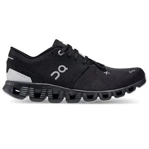 A black athletic shoe with a distinctive sole pattern and \“On\“ branding, designed for sports or running activities.
